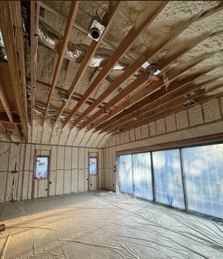 Interior walls and ceiling insulated with spray foam during new construction in Centreville